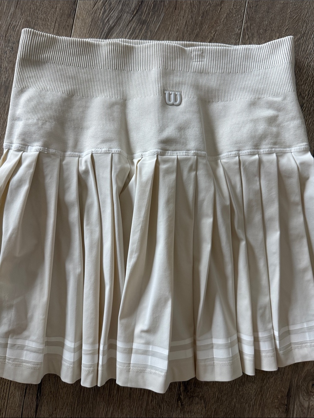 Wilson Mid Town Tennis Skirt Cream Pleated Skirt with Subtle Hem Stripes - Picture 2 of 4